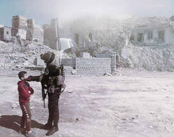 Снимок The Kid of Mosul фотографа из Италии Antonio Denti, получивший награду Merit Award на конкурсе All About Photo Awards 2022