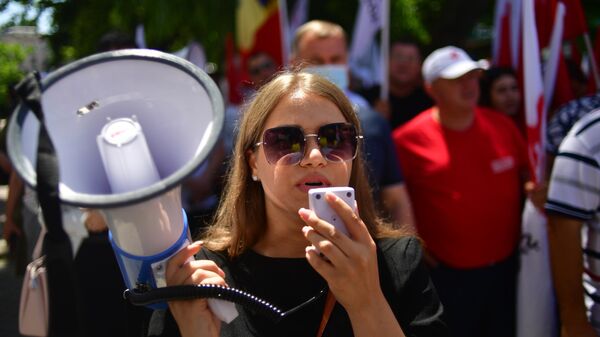 Сторонники Партии социалистов Республики Молдова (ПСРМ) на акции протеста в Кишиневе