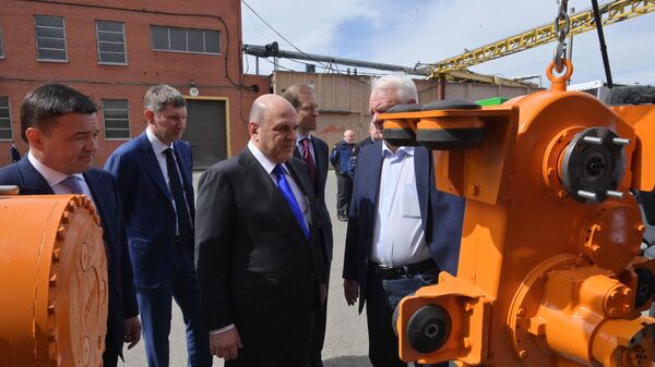 Председатель правительства РФ Михаил Мишустин во время посещения машиностроительного завода Тонар в Московской области