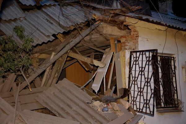 Последствия обстрела ВСУ жилого сектора в Калининском районе Донецка