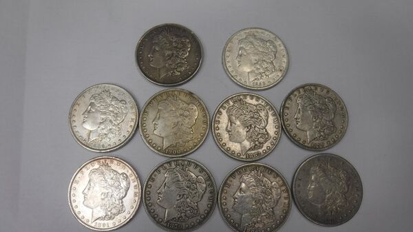 34 серебряные монеты номиналом один доллар в багаже у гражданина США, вылетавшего из Южно-Сахалинска в Токио