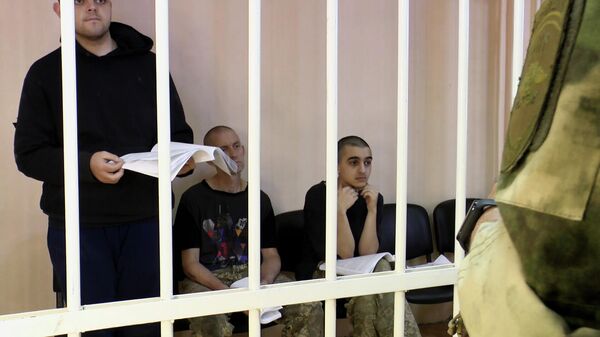 Заседание суда в ДНР, где граждане Британии и гражданин Марокко частично признали вину