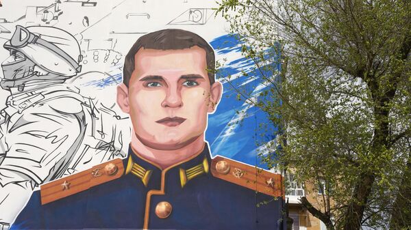 Граффити в честь подвига Ивана Величко, который погиб в ходе проведения специальной военной операции на Украине,  на стене дома № 36 по улице 20-летия Октября в Воронеже