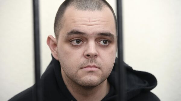 Гражданин Великобритании Эйден Эслин, обвиняемый в участии в качестве наемника в боевых действиях на территории ДНР в составе украинских вооруженных формирований, в зале суда в Донецке