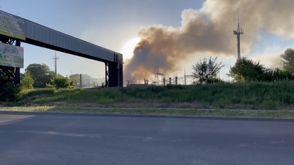Дым от взрыва в Бердянске. 12 июня 2022