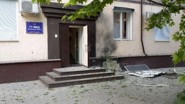 Последствия теракта, совершенного украинскими боевиками у здания МВД в Мелитополе