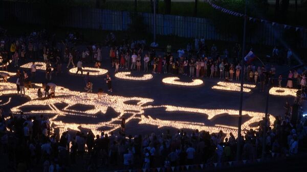 Изображения с надписью Россия и гербом РФ из 25 тыс свечей выложили в Подмосковье
