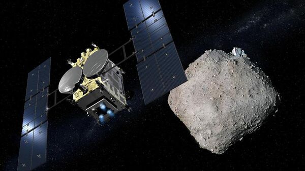 Космический аппарат Хаябуса-2 приближается к астероиду Рюгу (представление художника)