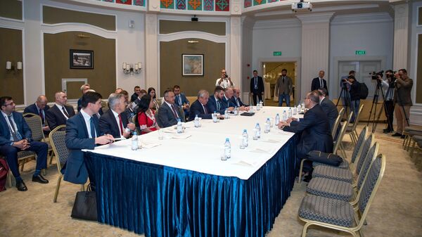 Участники XVIII международной встречи по Сирии в астанинском формате в Нур-Султане. 15 июня 2022
