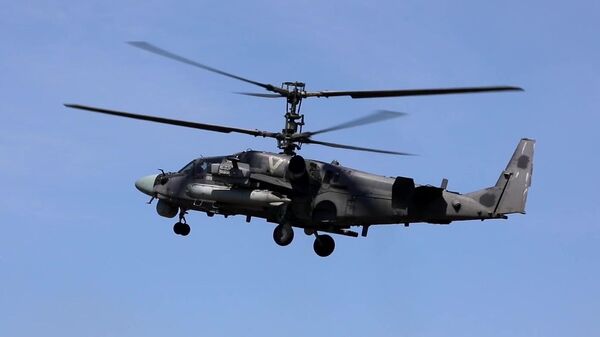 Ударный вертолет Ка-52 ВКС России, задействованный в специальной военной операции. Скриншот видео