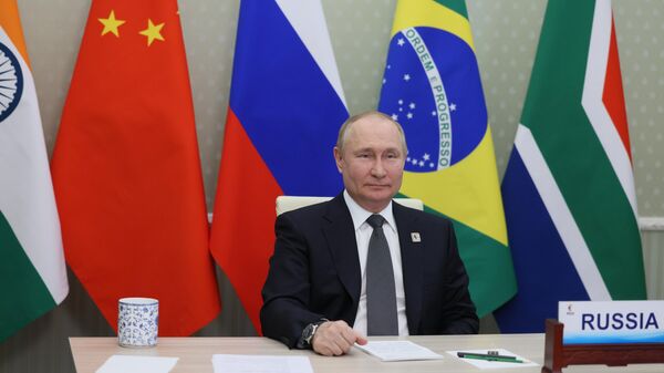 Президент России Владимир Путин принимает участие в режиме видеоконференции в XIV саммите БРИКС