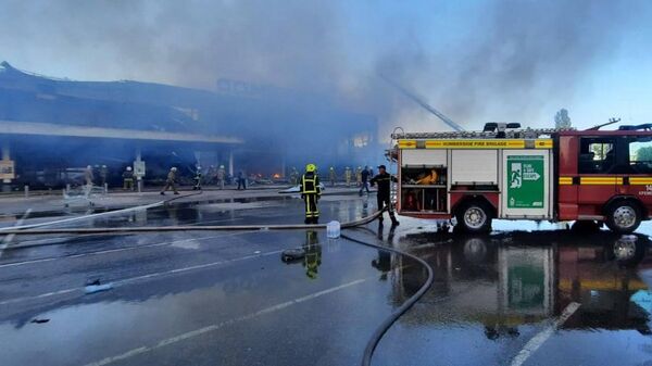 Ликвидация пожара в торговом центре в Кременчуге, Украина