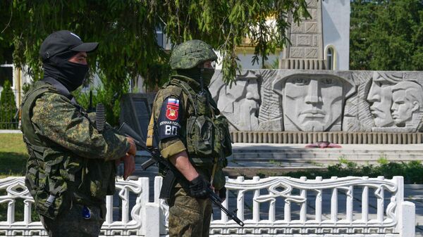 Военнослужащие Вооруженных сил РФ в одном из поселков Харьковской области в зоне специальной военной операции на Украине