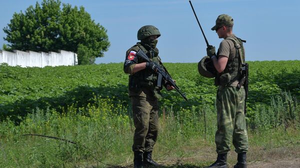 Российские военнослужащие на блокпосту на въезде в населенный пункт в Харьковской области в зоне проведения специальной военной операции