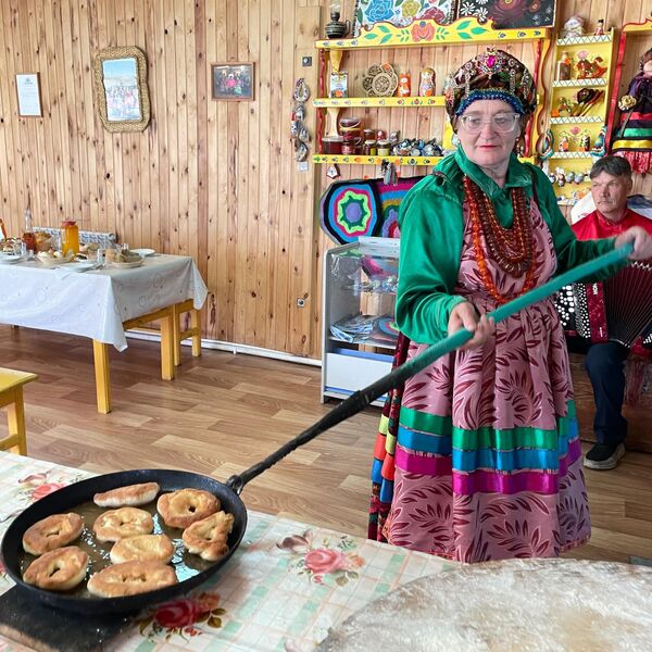 Пончики, приготовленные в дровяной печи в селе Десятниково