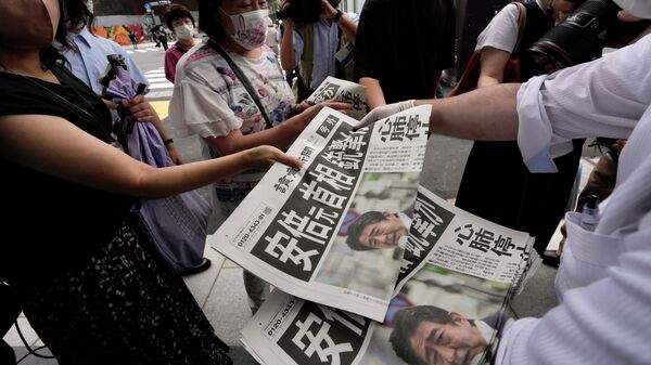 Prints of the Yomiuri Shimbun newspaper reporting the attack on former Japanese Prime Minister Shinzo Abe 