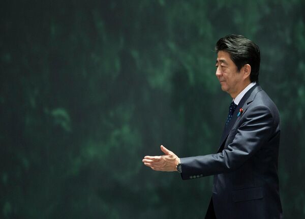 Премьер-министр Японии Синдзо Абэ. 25 июля 2014