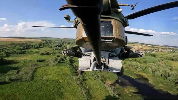 Кадры работы вертолетов Ми-28 в ходе спецоперации на Украине