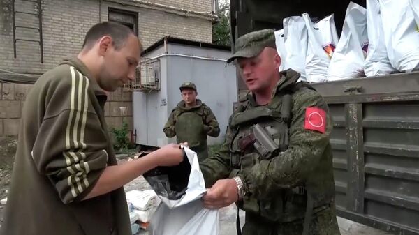 Раздача пяти тонн гуманитарной помощи жителям освобожденного Лисичанска