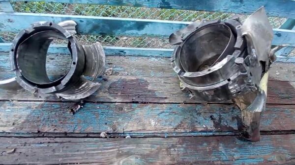 Обломки боеприпаса HIMARS, найденные на месте обстрела следственного изолятора в Еленовке. Скриншот видео