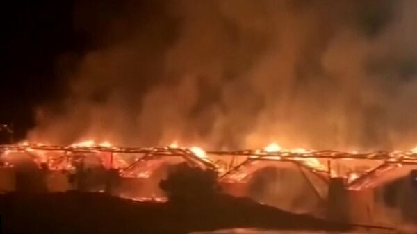 На востоке Китая сгорел 900-летний деревянный мост. Видео с места ЧП