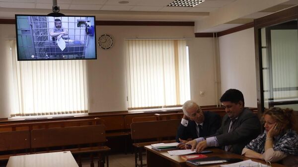 Адвокаты в зале судебных заседаний в Московском городском суде, где рассматривается апелляция на избрании меры пресечения Илье Яшину*