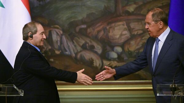 Министр иностранных дел России Сергей Лавров и министр иностранных дел Сирии Фейсал Микдад