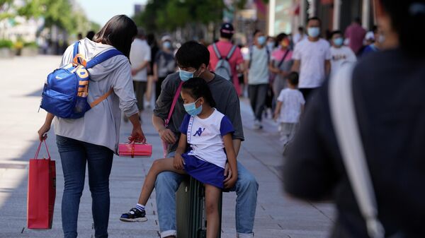 Семья на улице в Пекине