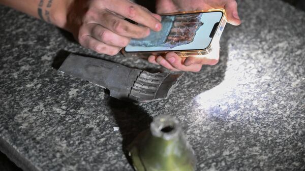 Найденные осколки снарядов, которыми Вооруженных сил Украины обстреляли центр Донецка