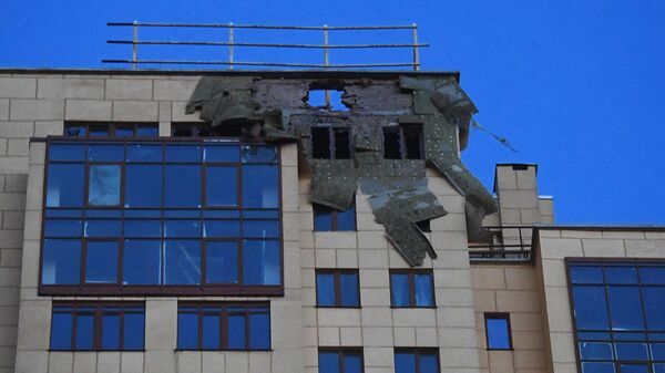 Последствия обстрела со стороны Вооруженных сил Украины в центре Донецка