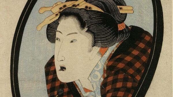 Japanese woman blackens her teeth