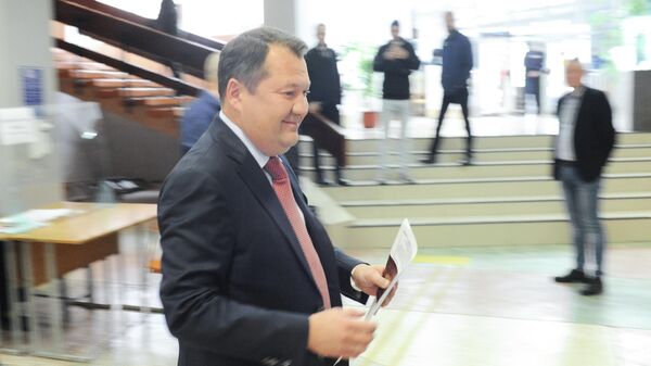 Maxim Yegorov, deputy head of the administration of the Tambov region, votes at ballot box 686 in Tambov