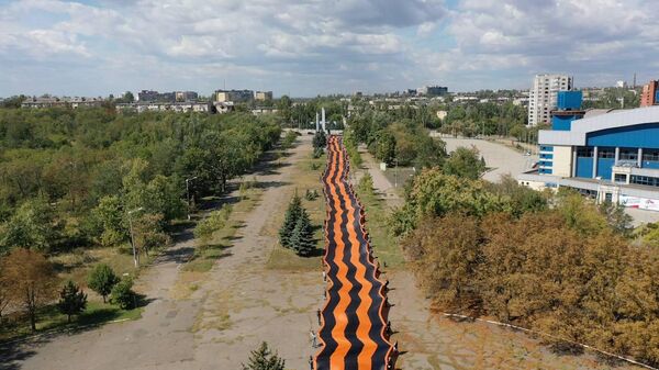 Активисты Молодой Гвардии Единой России и Волонтерской Роты развернули самую большую в мире Георгиевскую ленту
