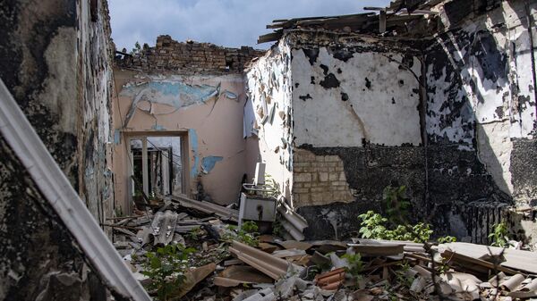 Разрушенный в результате обстрела ВСУ один из корпусов Центральной городской больницы в городе Васильевка Запорожской области