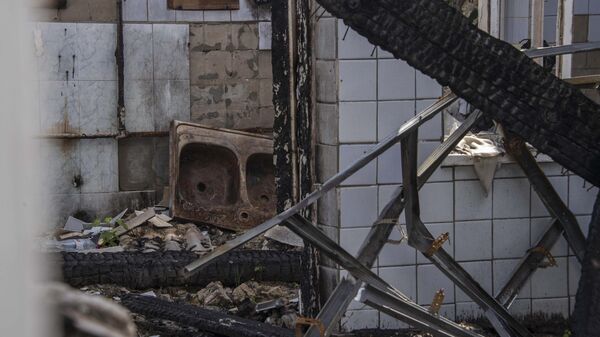 Частично разрушенный в результате обстрела ВСУ один из корпусов Васильевской центральной городской больницы в городе Васильевка Запорожской области
