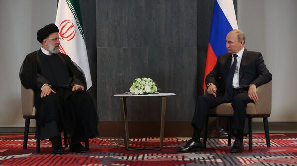 Президент России Владимир Путин и президент Ирана Ибрахим Раиси во время встречи на полях саммита ШОС в Самарканде