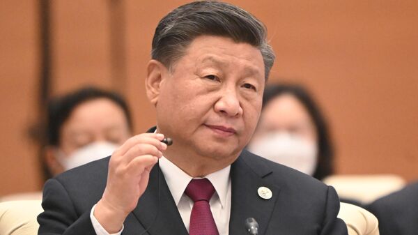 Байден заявил об остановке вложений в КНР в случае поддержки России