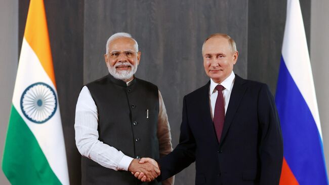 Владимир Путин и Нарендра Моди во время встречи на полях саммита ШОС