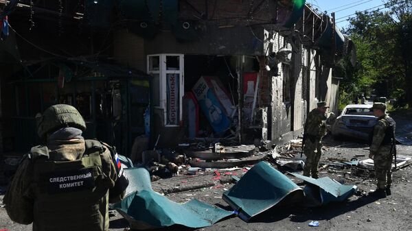 Российская следственная группа прибыла на место обстрела в Донецке