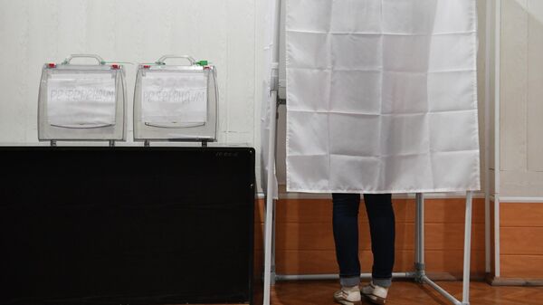 Голосование на избирательном участке в Мелитополе