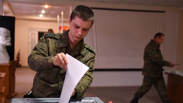Soldiers of the LPR People's Militia vote in Luhansk in a referendum on the entry of the LPR into Russia