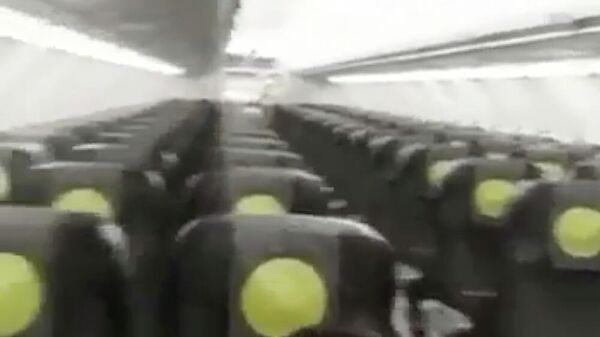Кадр видео, снятого пассажиром рейса S7 Airlines из Бишкека в Иркутск