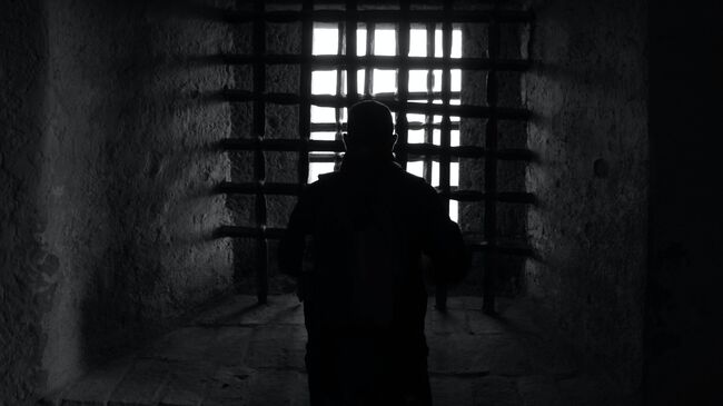 Заключенный в тюрьме