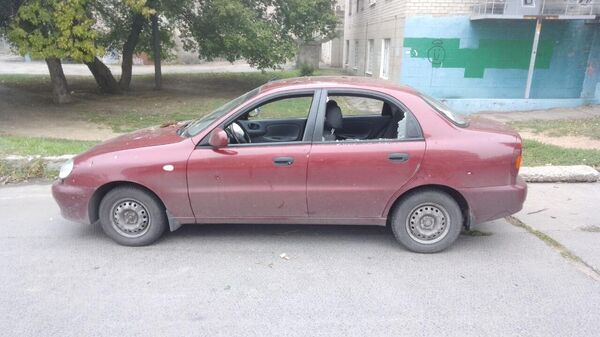 Автомобиль, поврежденный в результате взрыва в Мелитополе