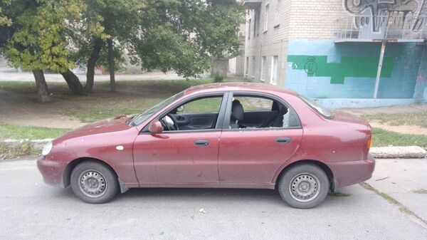 Автомобиль, поврежденный в результате взрыва в Мелитополе