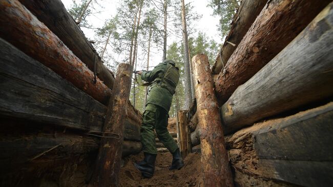 Мобилизованный гражданин в окопе