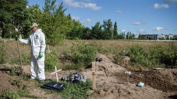 Перезахоронение останков погибших от обстрелов ВСУ в Рубежном