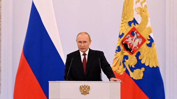 Президент России Владимир Путин выступает на церемонии подписания договоров о вхождении в Российскую Федерацию  Донецкой и Луганской народных республик, Запорожской и Херсонской областей в Кремле