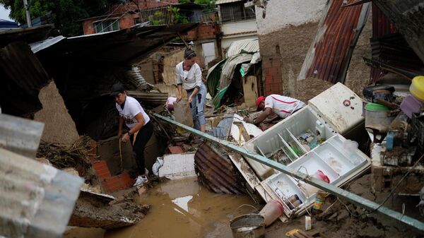 Последствия наводнения в общине Лас-Техериас в Венесуэле
