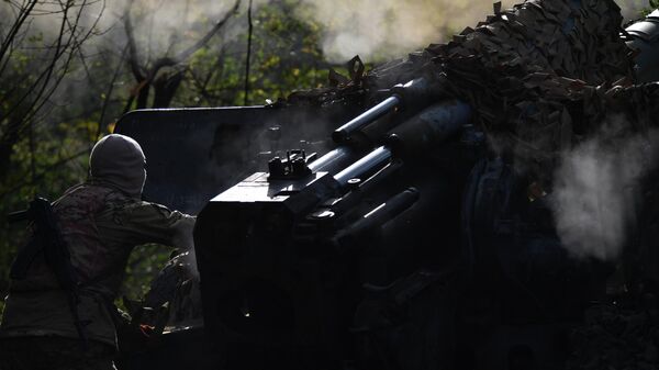 Бойцы артиллерийского расчета ЧВК Вагнер на территории ЛНР